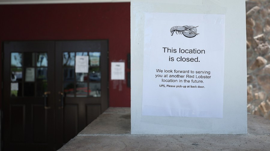 Image: A sign announcing the closure of a Red Lobster restaurant is posted on the front of a Red Lobster restaurant on May 14, 2024 in Fremont, California.