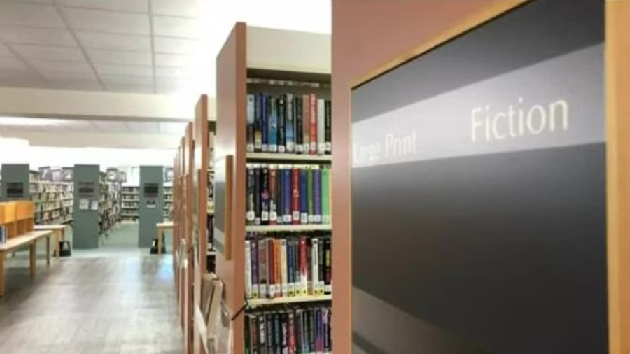 Image: Books at a Seattle Public Library location are shown....