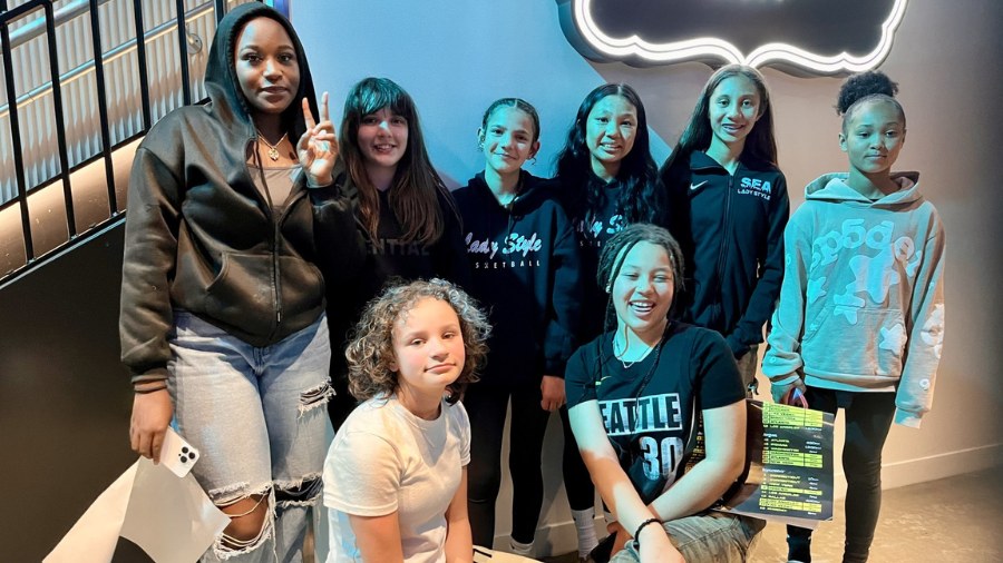 Image: Members of the 12-year-old girls' Seattle Rotary Lady Style Basketball team gathered at Clim...
