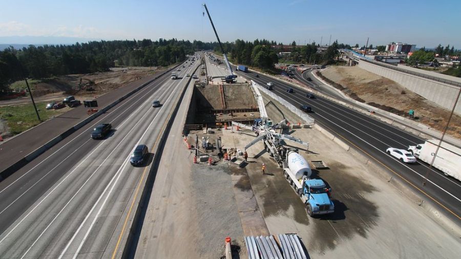 Photo: WSDOT crews pump concrete at new Veterans Drive tunnel....