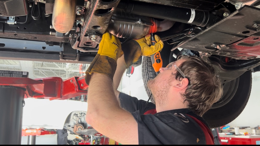 Image: A technician works on a catalytic converter at Titus-Will Toyota in Tacoma on Tuesday, Nov. ...